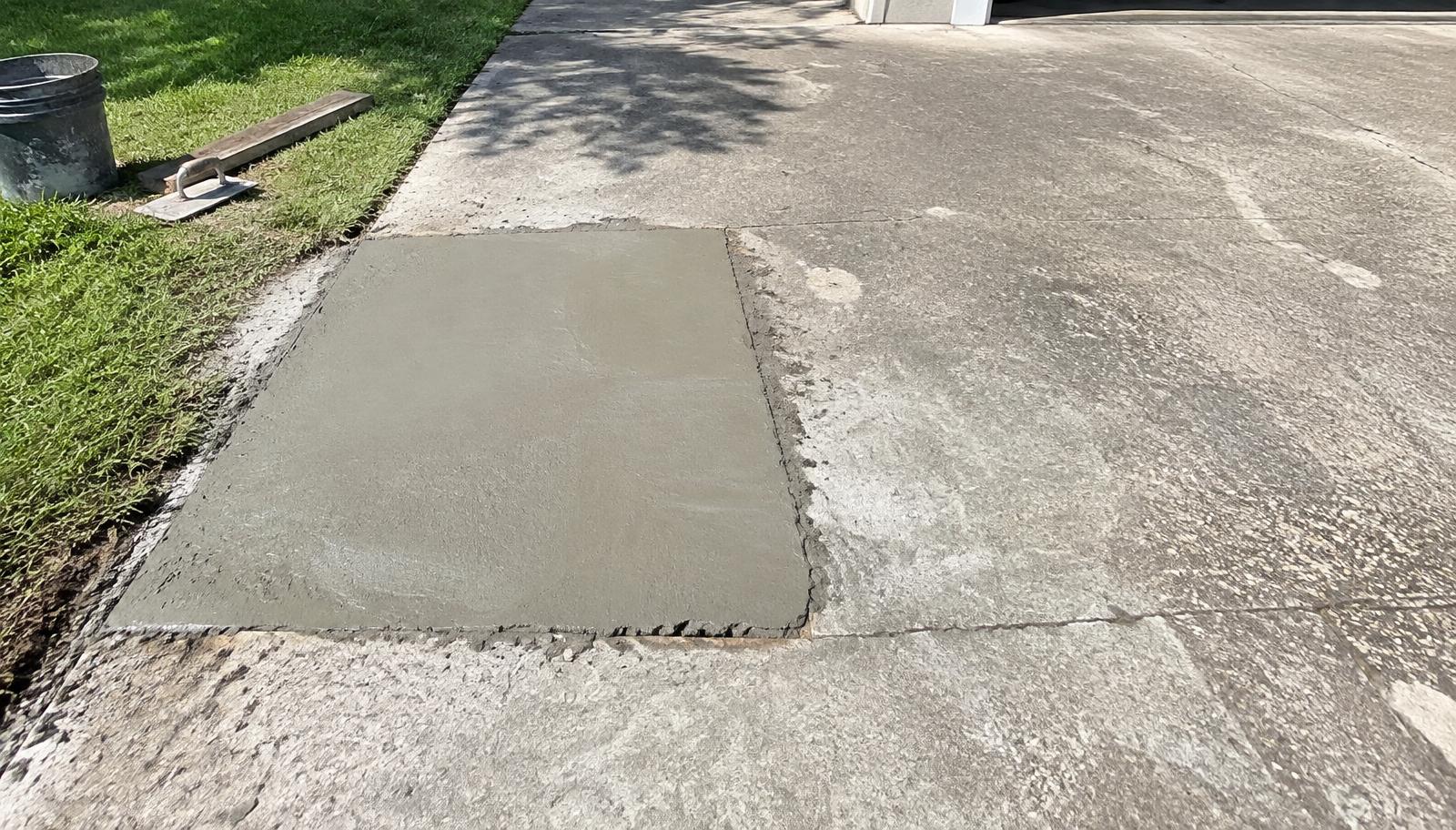 Damaged driveway section cut out and replaced with fresh concrete in Citrus County, FL